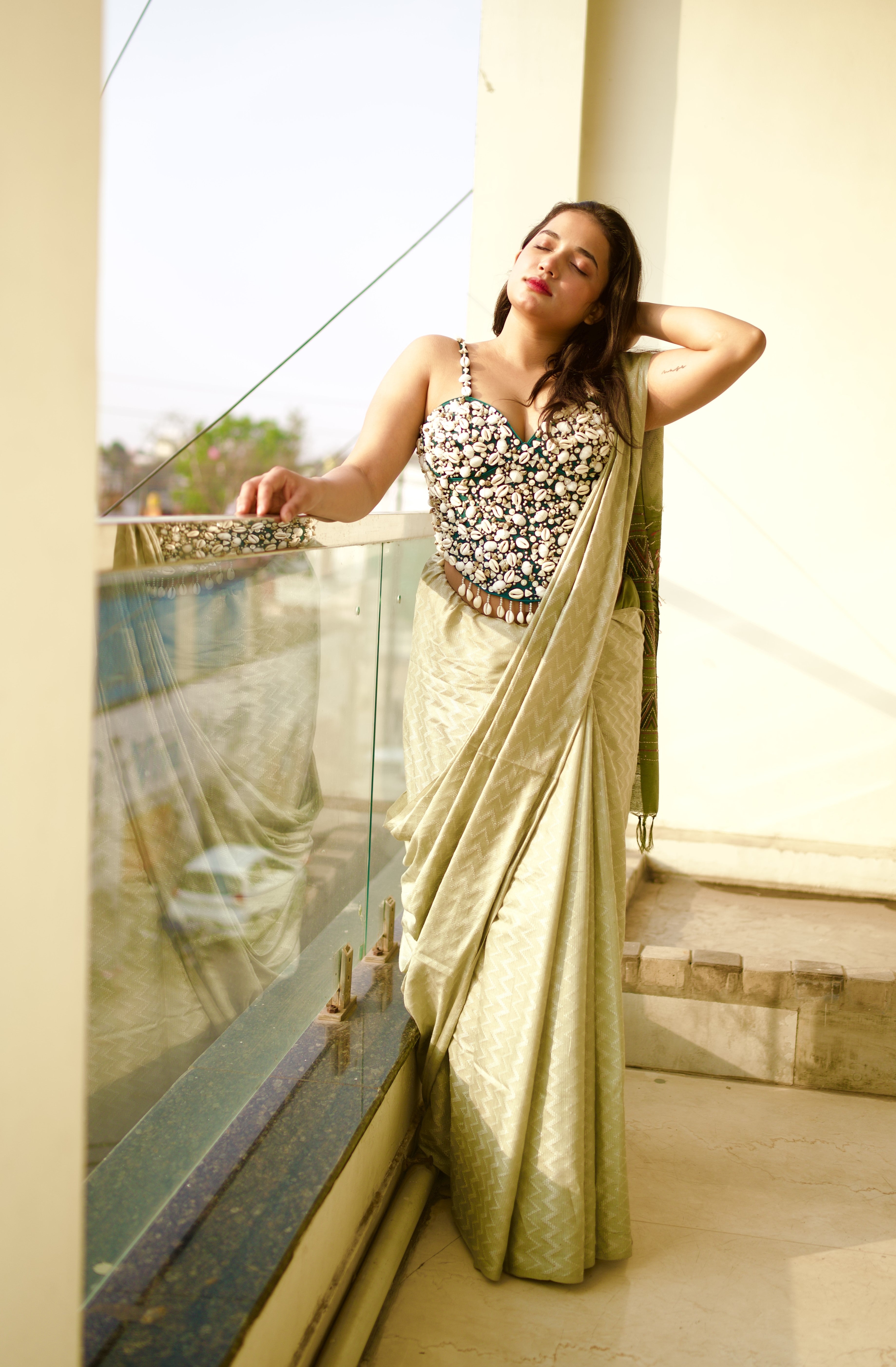 Emerald Shell-Embellished Couture Blouse with Ivory Saree