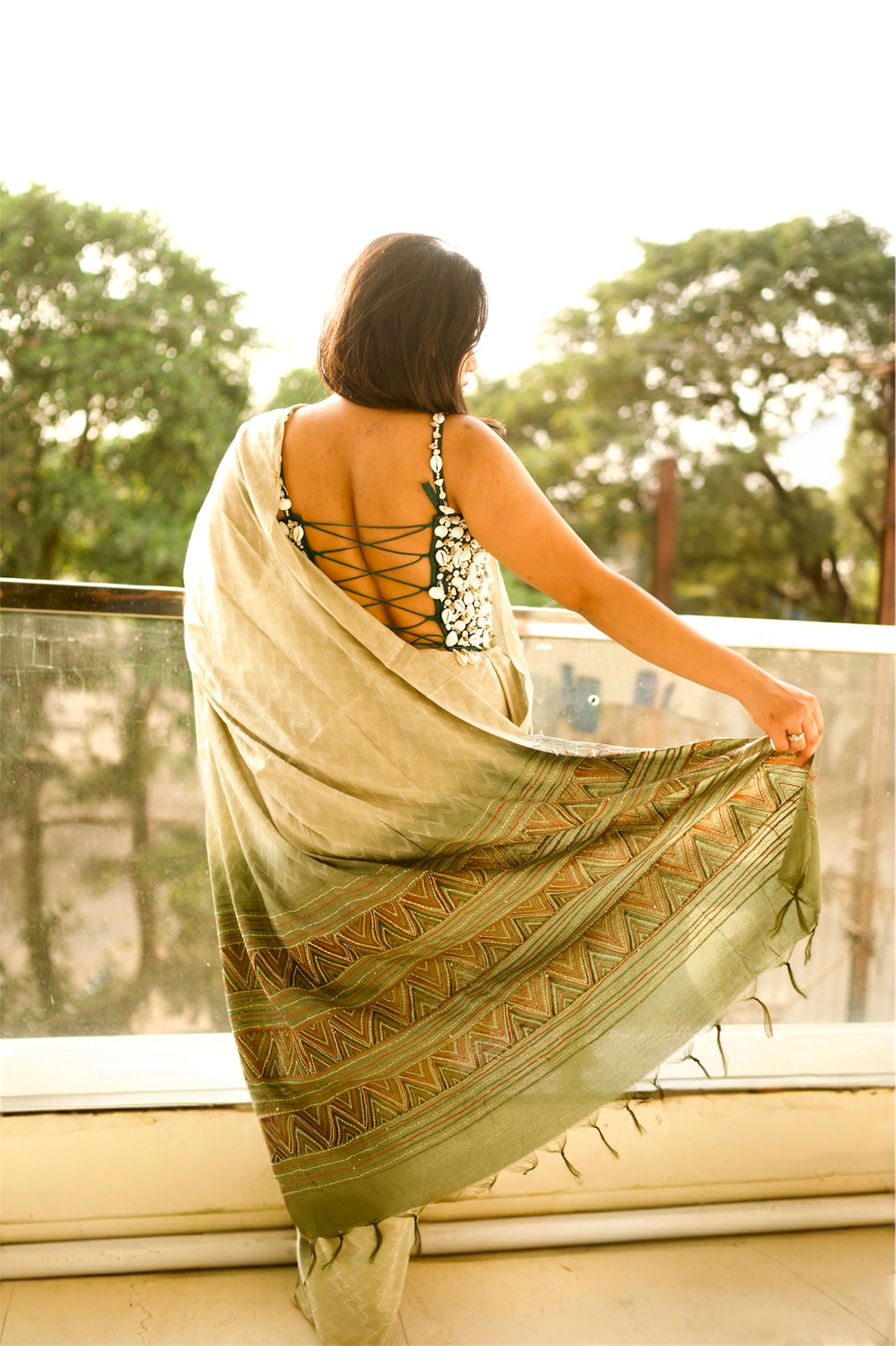 Emerald Shell-Embellished Couture Blouse with Ivory Saree