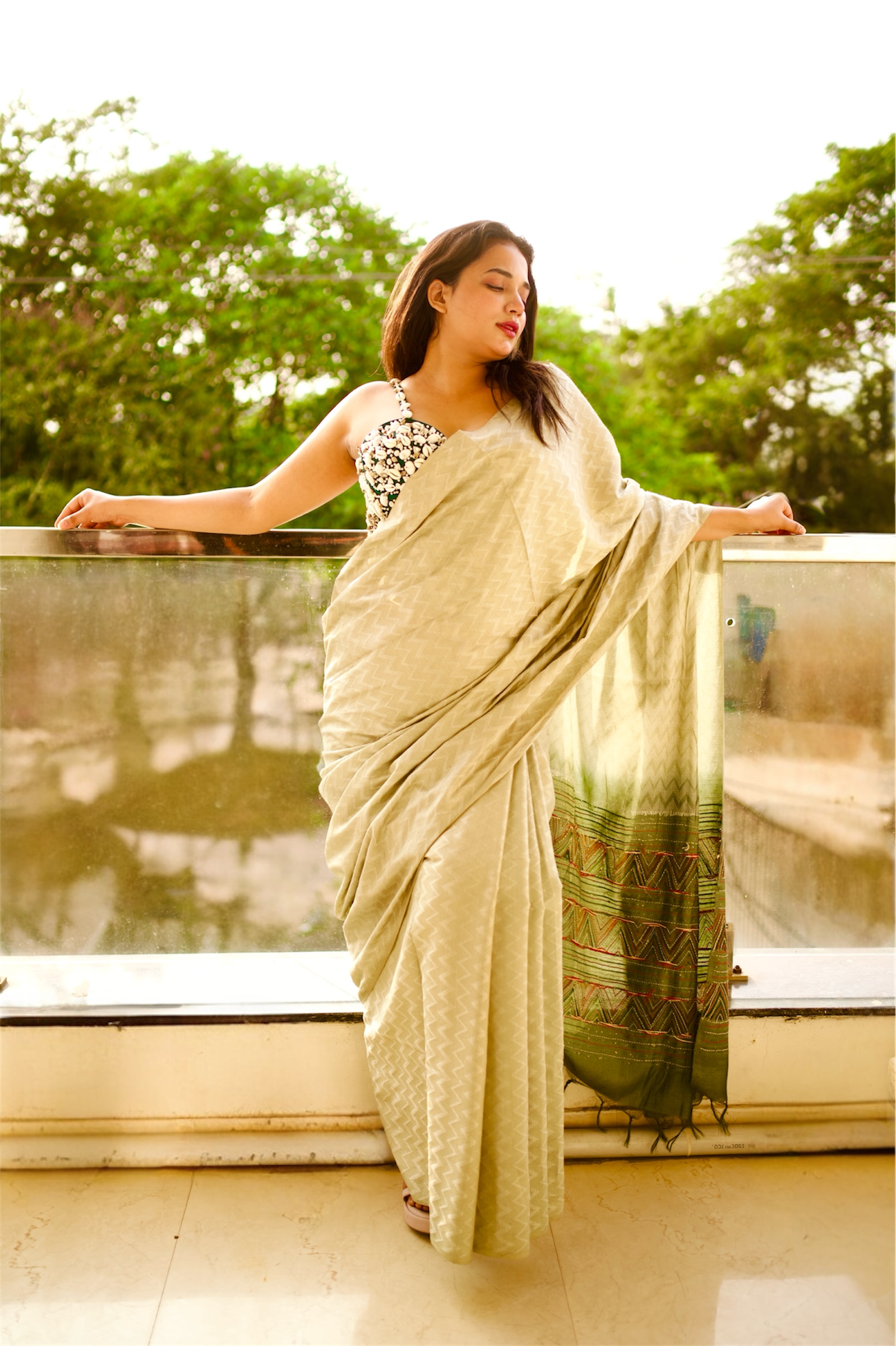Emerald Shell-Embellished Couture Blouse with Ivory Saree