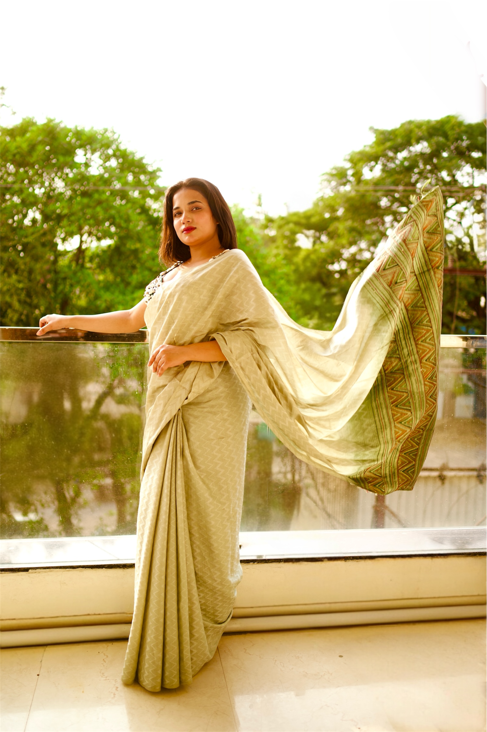 Emerald Shell-Embellished Couture Blouse with Ivory Saree